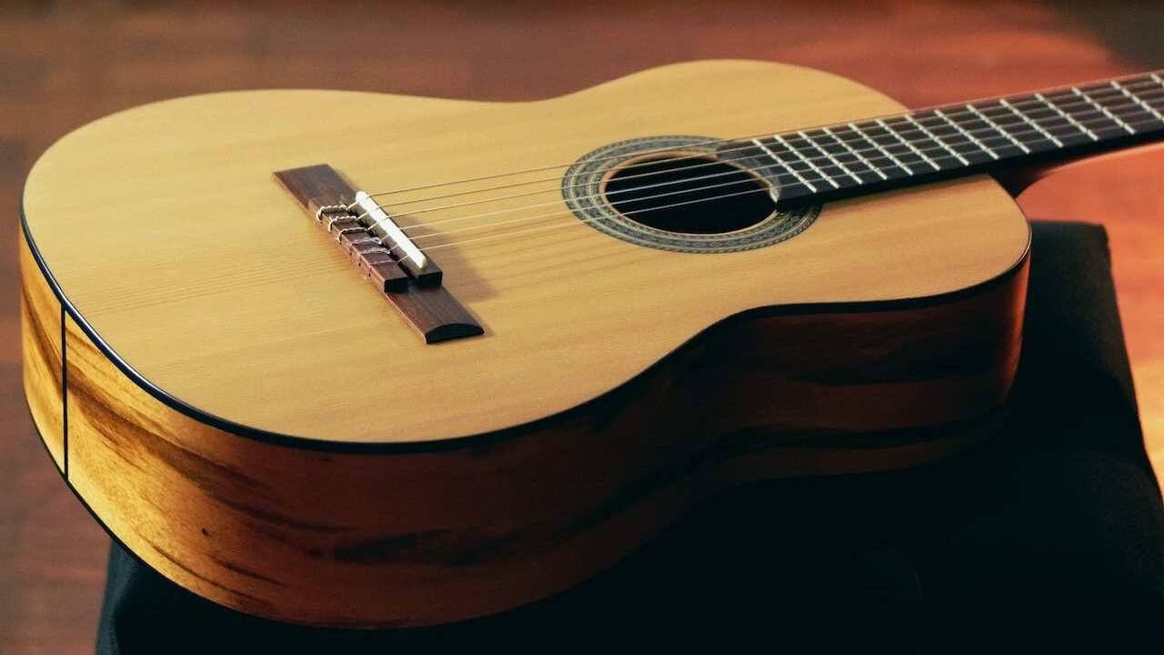 Nylon string guitar on its back