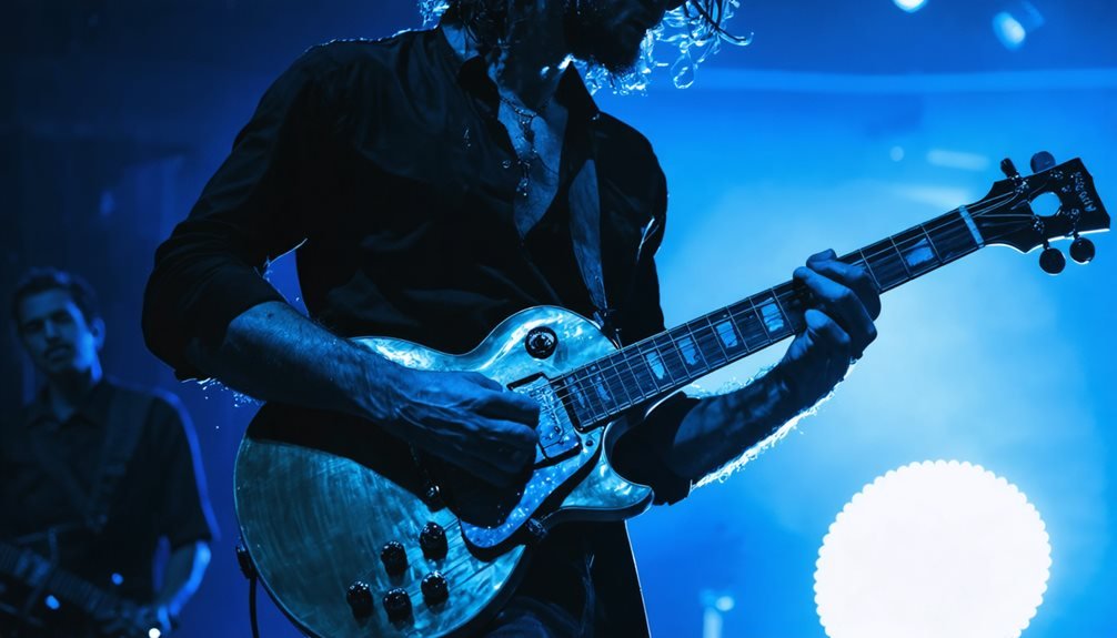 Guitarists on a stage in blue light